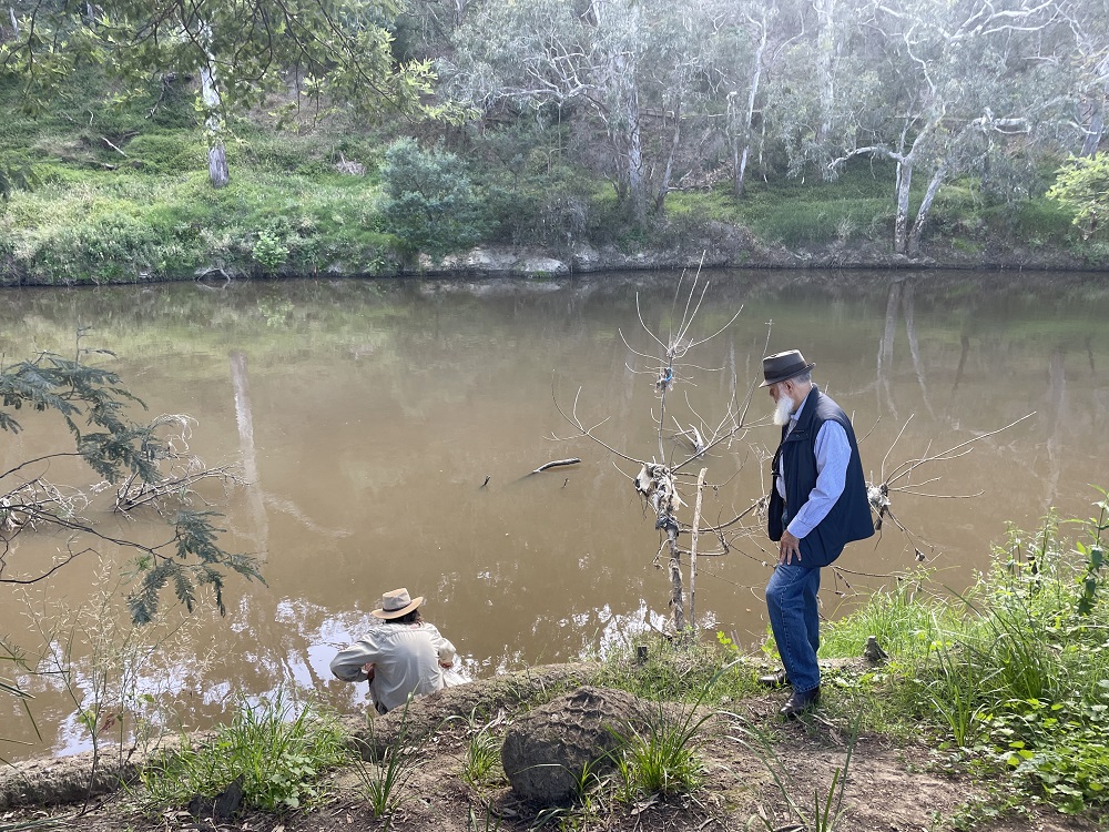 Uncle Dave and Uncle Andrew performing water exchange as part of Sydney Biennale, Collingwood Children's Farm 2023  
