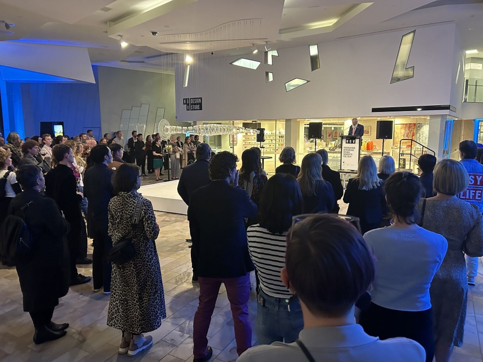 A crowd gathered at the NGV Fed Square for the opening of Reimagining Birrarung 2070 exhibition